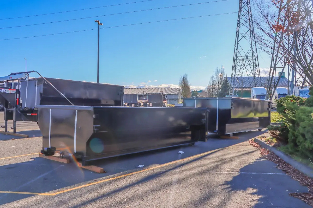 Roll-off dumpster ready for waste disposal at job site for 3 Yard Dumpster Rental in Forest Park